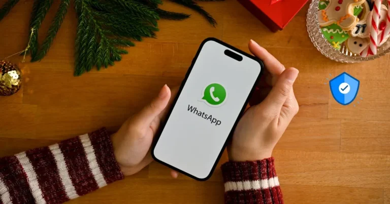 Person holding smartphone showing WhatsApp logo, highlighting WhatsApp Security during holiday season